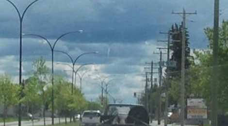 A funnel cloud forms over Steinbach on May 28th.
