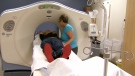 A man undergoes a CT scan to screen for lung cancer on Sept.4, 2013.