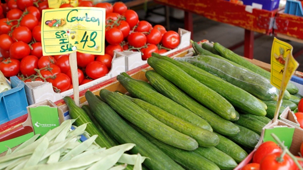 Cucumbers from Spain, tomatoes and other vegetables are on display on a market in Hamburg northern Germany in this picture taken May 26, 2011. (AP Photo / dapd / Marius Roeer)