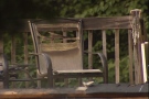 A melted patio chair sits on the property of a home destroyed by fire in Aylmer, QC on Thursday, Sept. 5, 2013.