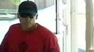London police have released this image taken from surveillance video of a man wanted in connection with a robbery at a Scotia Bank on Thursday, Sept. 5, 2013.