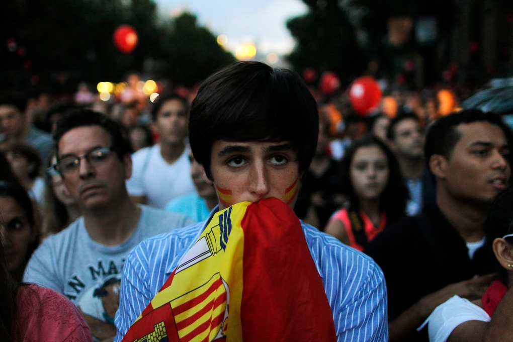 A young man reacts in Madrid, Spain