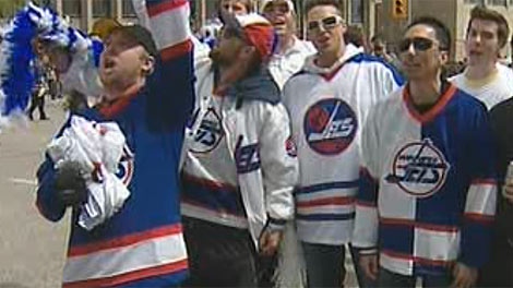 Hockey fans gathered Tuesday morning at Portage and Main to celebrate the news an NHL franchise was returning to Winnipeg. 
