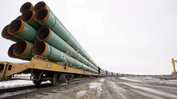 In this Feb. 28, 2008 file photo, rail cars arrive in Milton, N.D., loaded with pipe for TransCanada's Keystone Pipeline project, which carries crude oil across Saskatchewan and Manitoba, and through North Dakota, South Dakota, Nebraska, Kansas, Missouri and Illinois. (Grand Forks Herald, Eric Hylden THE CANADIAN PRESS / AP)
