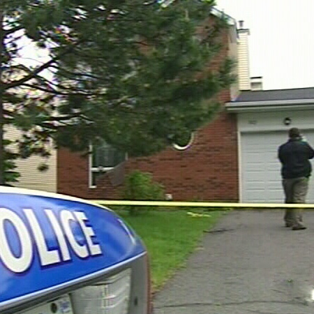 Police investigate following an alleged murder-suicide in Ottawa's east end, Sunday, June 1, 2008.