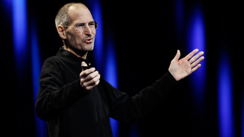 Apple CEO Steve Jobs gestures to his audience during a keynote address to the Apple Worldwide Developers Conference in San Francisco, Monday, June 6, 2011. (AP / Paul Sakuma) 