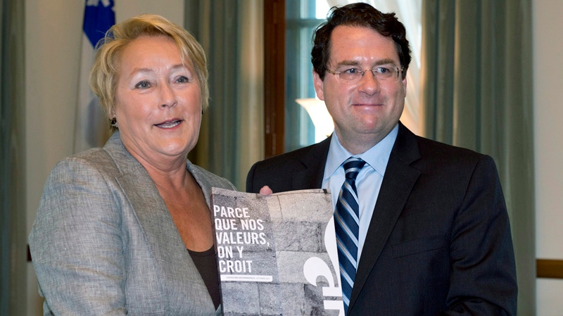 Quebec Premier Pauline Marois receives the tables 