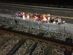 A makeshift memorial was set up along the VIA Rail tracks at Fallowfield station on September 18, 2013. The City of Ottawa is talking to the families of the six people killed in the tragedy about plans for a permanent memorial.