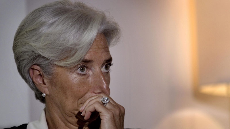 French Finance Minister Christine Lagarde gestures during a press conference, in New Delhi, India, Tuesday, June 7, 2011. (AP Photo/Manish Swarup)