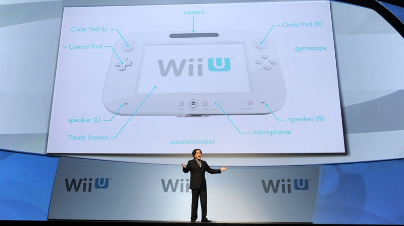 Satoru Iwata, President of Nintendo Co., Ltd., discusses their new gaming console the Wii U during a news conference at the E3 Gaming Convention in Los Angeles, Tuesday, June 7, 2011. (AP Photo/Chris Pizzello)