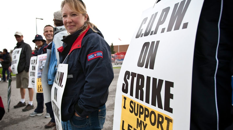 Postal workers are sticking to their strategy of limited rotating strikes for another day, targeting Calgary on Wednesday, June 8, 2011.  (Jeff McIntosh / THE CANADIAN PRESS)
