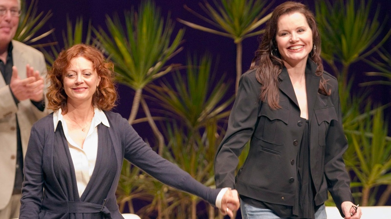 Susan Sarandon and Geena Davis arrive on stage for a 'Thelma and Louise' 20th anniversary event in Toronto on Tuesday, June 7, 2011. (Frank Gunn / THE CANADIAN PRESS)   