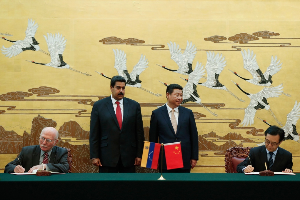 Chinese Xi Jinping, Venezuela's Nicolas Maduro