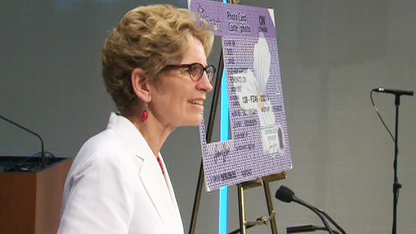 Ontario Transportation Minister Kathleen Wynne unveils a new secure identification card for Ontario residents on June 9, 2011. 