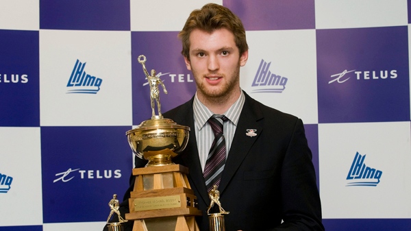 Sean Couturier with the Drummondville Voltigeurs holds the Michael Bossy Trophy for best professional prospect at the QMJHL awards ceremony in Montreal, Wednesday, April 6, 2011. The CANADIAN PRESS/Graham Hughes