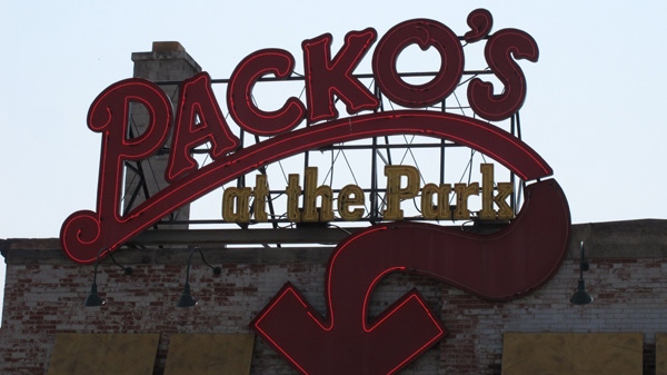 This June 8, 2011 photo shows a neon sign above Tony Packo's restaurant, in Toledo, Ohio. (AP Photo/John Seewer)
