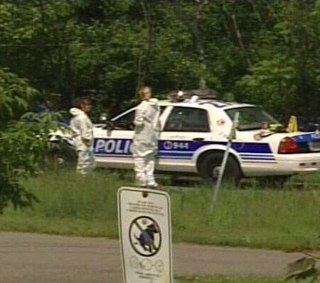 Ottawa police continue to comb an area near Britannia Park for clues, Thursday, June 5, 2008.