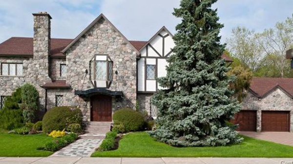 The Montreal home (exterior pictured) of reputed mob boss Vito Rizzuto, who is currently residing in a U.S. prison for racketeering, is up for sale, Friday June 10, 2011. THE CANADIAN PRESS/ HO