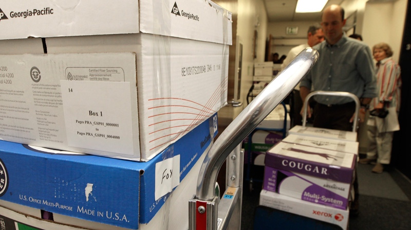 Boxes containing thousands of pages of Sarah Palin's emails from her first 21 months as governor, are seen moments before being released on Friday, June 10, 2011 in Juneau, Alaska.  (AP / Brian Wallace)