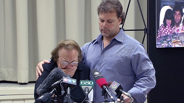 The family of murder victim Morris Conte appears at a press conference on June 13, 2011 to plea for information about the man's death.