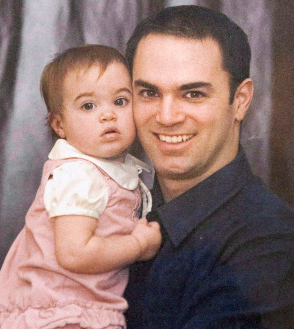 Guy Turcotte holds his daughter Anne-Sophie
