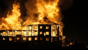 About 150 residents were displaced by a fire that destroyed a condo which was under construction in Edmonton. Eighty fire fighters responded to the building, and the damage was estimated at $17 million.<br><br>A fire consumes a condo building under construction in Edmonton early Sunday morning, Sept. 29, 2013. (MyNews / Lee Marvin Bayhonan)