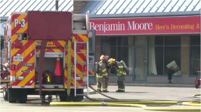 Fire crews put out a fire at Waterloo paint store.