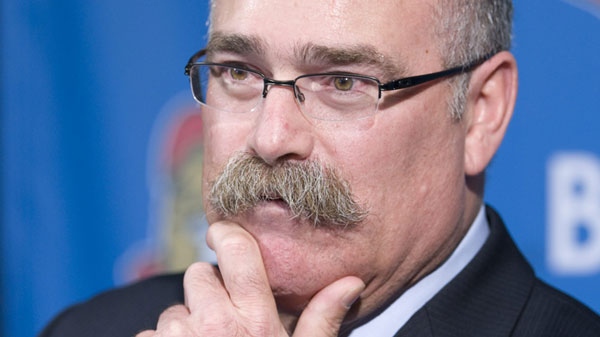Paul MacLean speaks with the media after being named the Ottawa Senators' new head coach at a news conference in Ottawa, Tuesday June 14, 2011. THE CANADIAN PRESS/Adrian Wyld