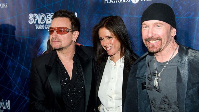 Bono, left, Julie Taymor and The Edge arrive at the opening night performance of the Broadway musical 'Spider-Man Turn Off the Dark' in New York, Tuesday, June 14, 2011. (AP / Charles Sykes)