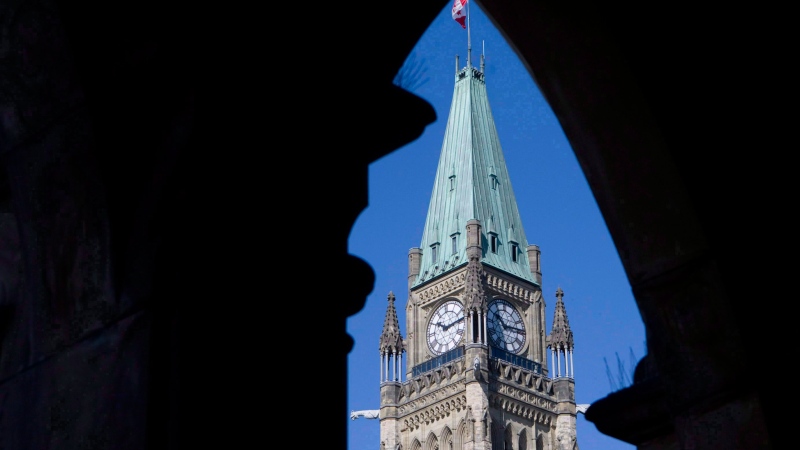 The Peace Tower is framed in an archway on the East Block of Parliament Buildings on Parliament Hill in Ottawa, Thursday, Sept., 10, 2009. (Adrian Wyld/The Canadian Press)