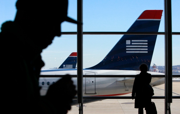 U.S. shutdown no reason to stop American Airlines-U.S. Airways merger ...