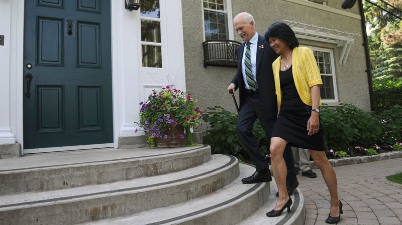 New Democratic Party leader Jack Layton and NDP MP Olivia Chow walk up to the entrance of Stornoway, the house of the leader of the opposition in Ottawa, on Wednesday, June 15, 2011. (Sean Kilpatrick / THE CANADIAN PRESS)
