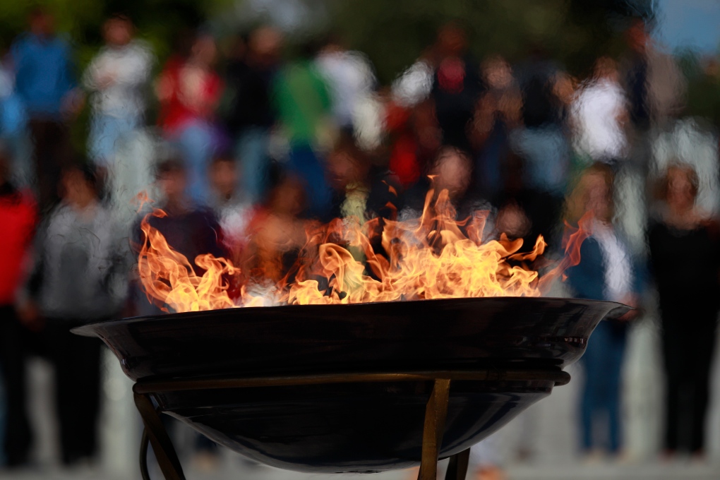 Protesting the Olympic flame in Athens