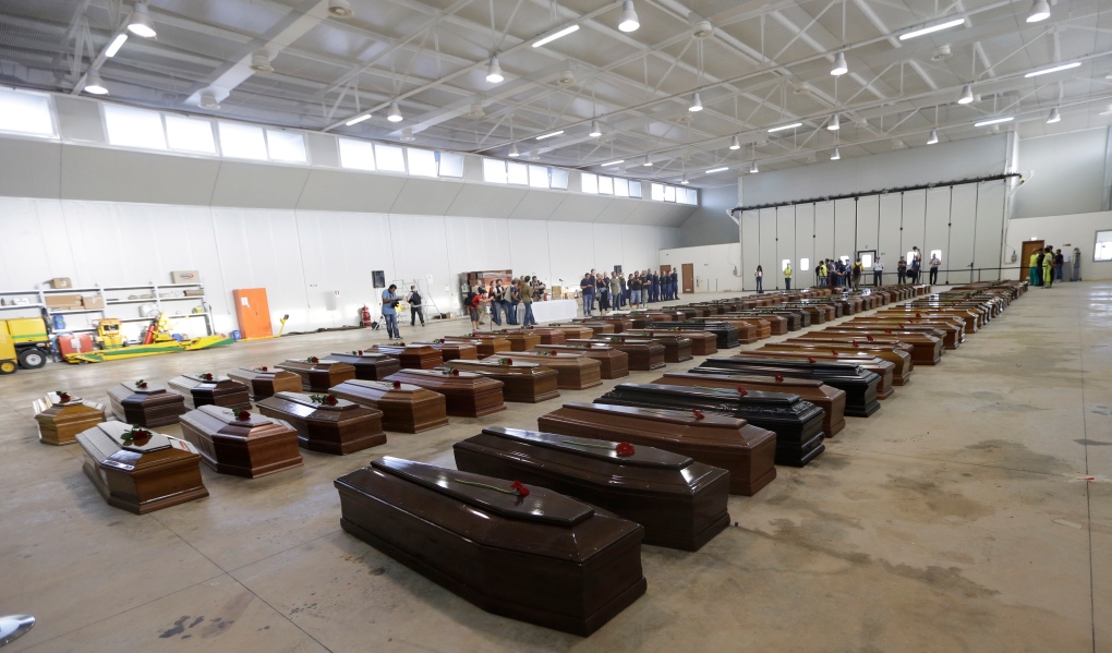 Coffins lined up at Lampedusa, Italy airport