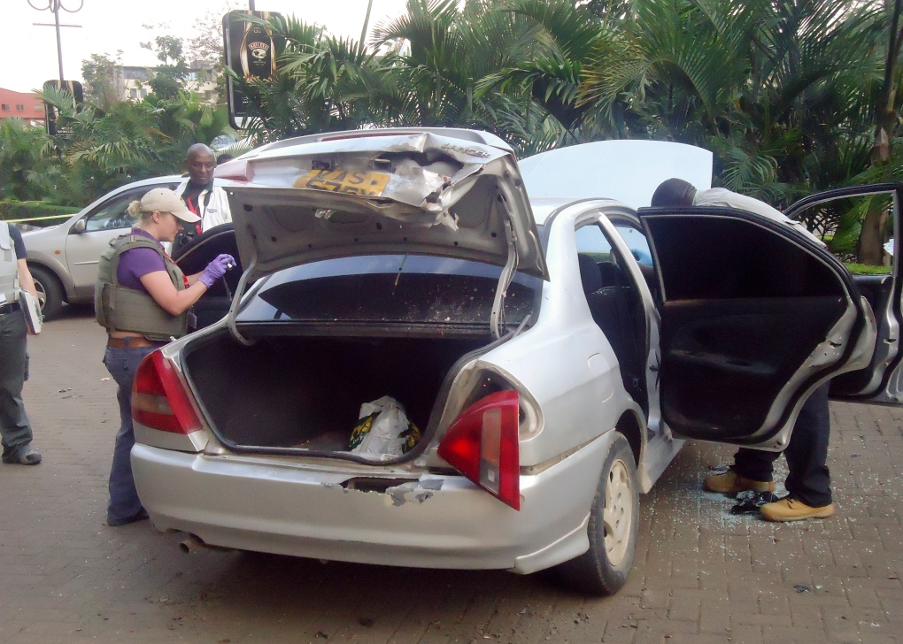 Inspecting a Mitsubishi Lancer near Westgate Mall