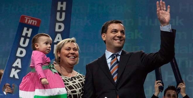 Leader of the Progressive Conservative Party of Ontario Tim Hudak, right, waves to the crowd on stage with his wife Debbie Hutton and daughter Miller after delivering the keynote address at the Annual General Meeting of the Progressive Conservative Party in Ottawa on Saturday, March 6, 2010. (Pawel Dwulit / THE CANADIAN PRESS)