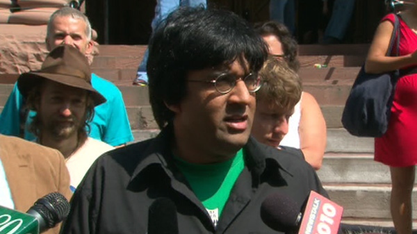Activist Jaggi Singh addresses media in Toronto following his sentence, Tuesday, June 21, 2011.