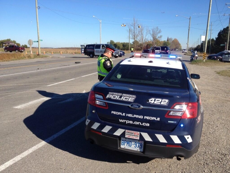Police guard the scene of a crash at Line 86 and Manser Road near Wallenstein, Ont., on Friday, Oct. 11, 2013. (Nadia Matos / CTV Kitchener)