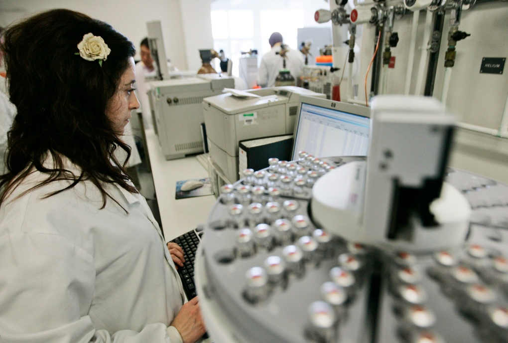 UK lab workers carry out doping tests