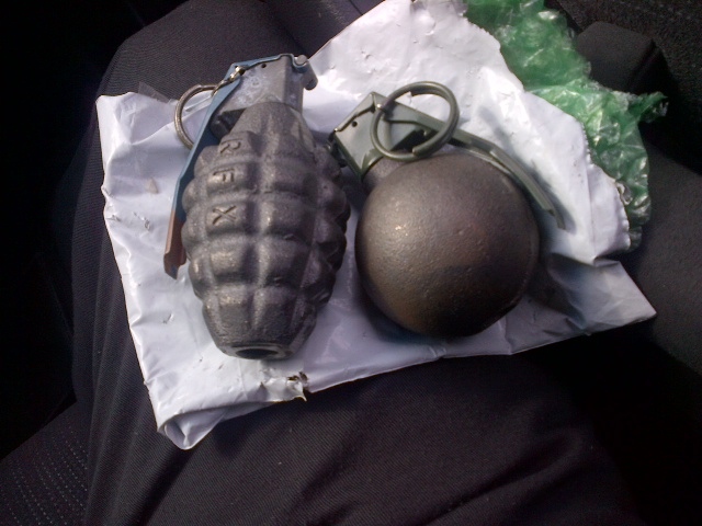 Two decorative, inert hand grenades that prompted the evacuation of the Federal Building in Sarnia, Ont. are seen on Tuesday, Oct. 15, 2013. (Const. Heather Emmons / Sarnia Police Service)