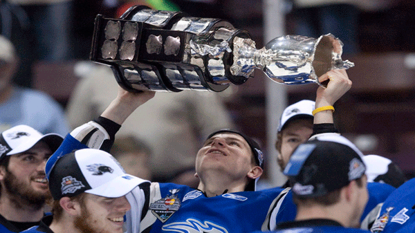 Saint John Sea Dogs' Nathan Beaulieu hoists the Memorial Cup after defeating the Mississauga St. Michael's Majors in the Memorial Cup final in Mississauga, Ont., Sunday, May 29, 2011. THE CANADIAN PRESS/Darren Calabrese