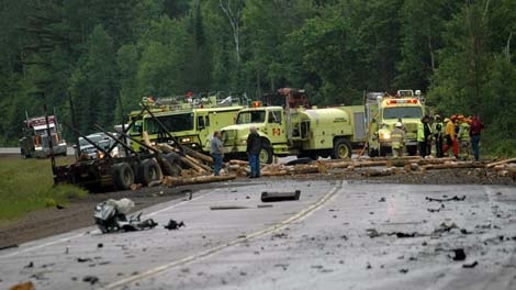 Logs litter Highway 17 near Pembroke after a fatal crash Wednesday, June 22, 2011.