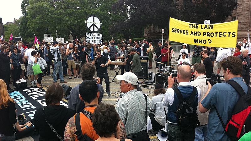Protesters gather outside Queen's Park to mark the one year anniversary of the G20 riots in Toronto. (Ramen Zarafshan / CTV News)