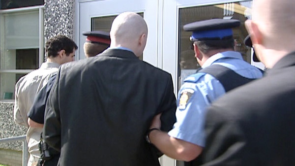 The three suspects in the murder of Nadia Gehl are escorted into the Superior Court of Justice in Kitchener, Ont. on Monday, June 27, 2011.