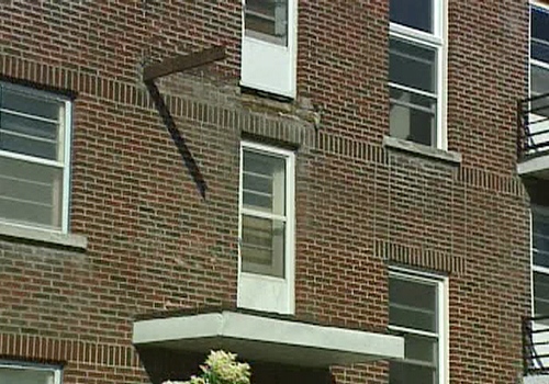 The facade of a balcony which fell to the ground injuring six peopleis seen in Ottawa, early Sunday, June 15, 2008.
