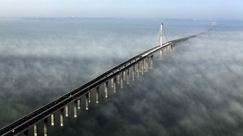 This photo taken Wednesday, June 29, 2011 released by China's Xinhua news agency shows the Jiaozhou Bay Bridge in Qingdao, east China's Shandong Province. (AP Photo/Xinhua, Yan Runbo)
