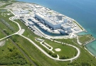 The Darlington Nuclear Generating Station, shown here, is Ontario Power Generation's newest CANDU (CANadian Deuterium Uranium) nuclear generating station. It is a 4-unit station with a total output of 3,524 megawatts (MW) and is located in the Municipality of Clarington in Durham Region, 70 km east of Toronto.