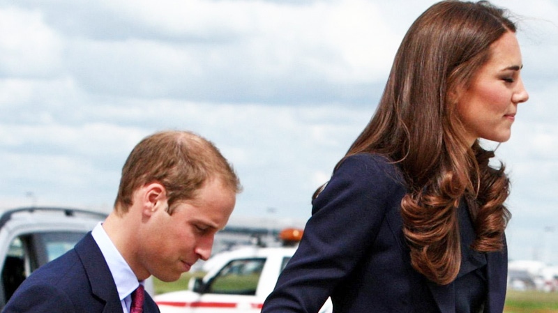 The Duke and Duchess of Cambridge board a plane of the Royal Canadian Air Force at London's Heathrow Airport, Thursday June 30, 2011. (AP / Steve Parsons) 