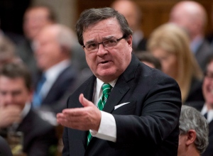 Minister of Finance Jim Flaherty responds to a question during Question Period in the House of Commons Wednesday, October 23, 2013 in Ottawa. (Adrian Wyld / THE CANADIAN PRESS)