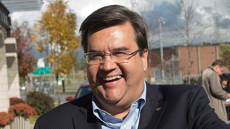 Montreal mayoral candidate Denis Coderre smiles as